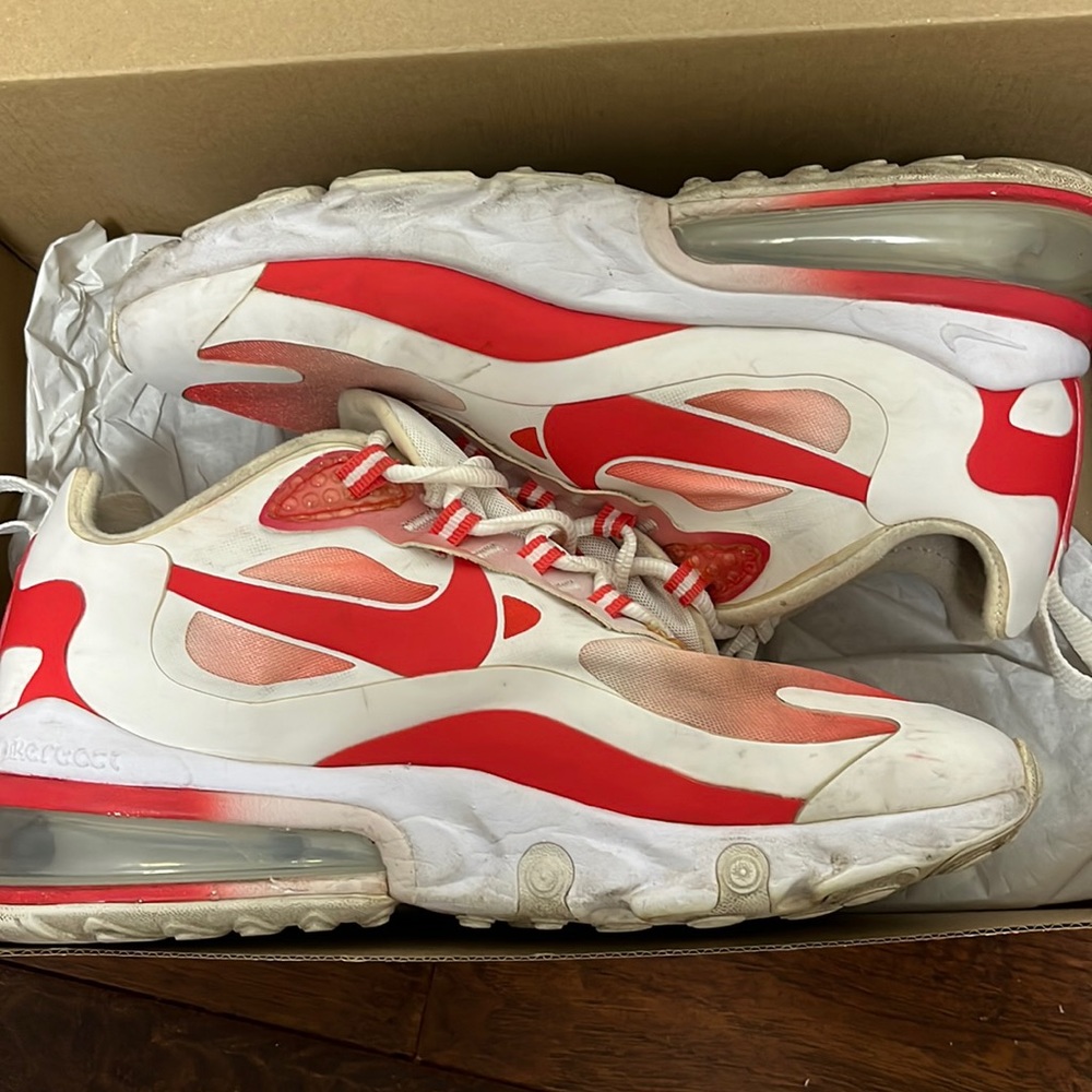 Size 7.5 red and white Nike reacts